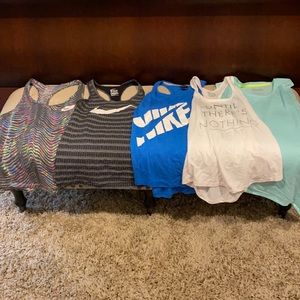 Bundle of Nike razor shirts and 2 short 1 skort